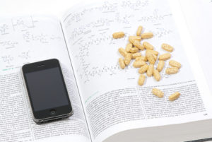 Doctor's journal with mobile phone