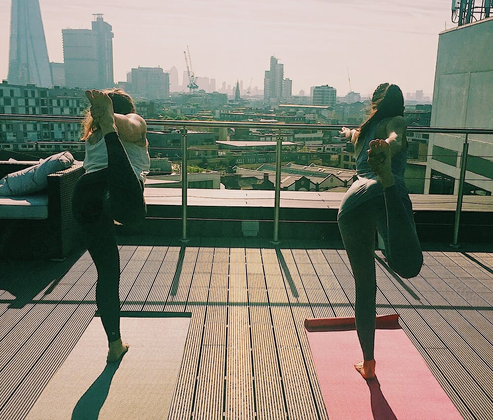 Axon employees doing yoga 