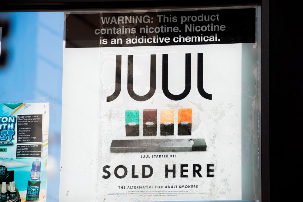 Juul suspends product advertising as new CEO steps in