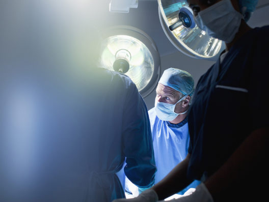 Critics question presence of medical device reps in operating rooms
