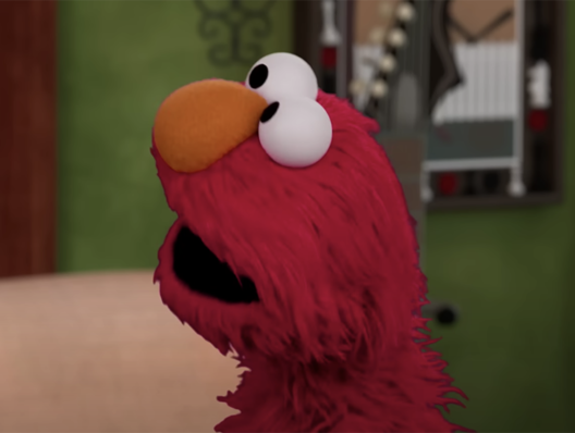 First Look: Elmo gets vaxxed
