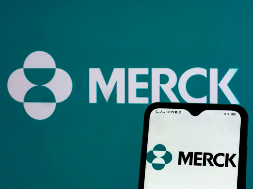 UKRAINE - 2021/05/22: In this photo illustration, a Merck & Co., Inc., logo seen displayed on a smartphone and in the background. (Photo Illustration by Igor Golovniov/SOPA Images/LightRocket via Getty Images)