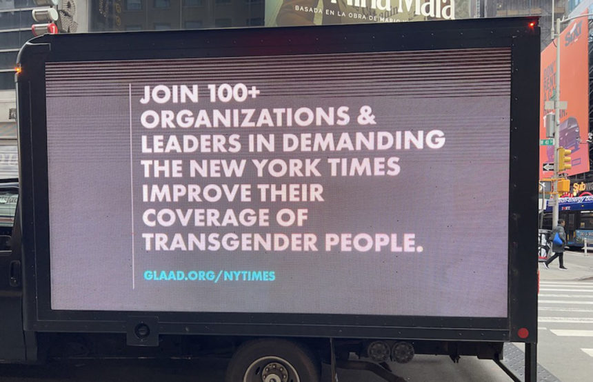 Image of a GLAAD protest billboard outside the Times' headquarters this week.