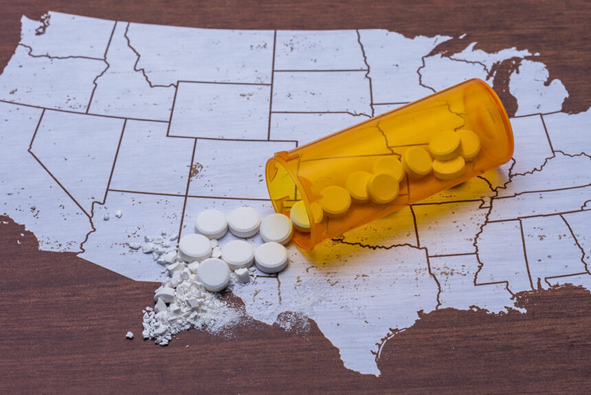 Pain medicine and opioid pills epidemic and addiction concept in United States