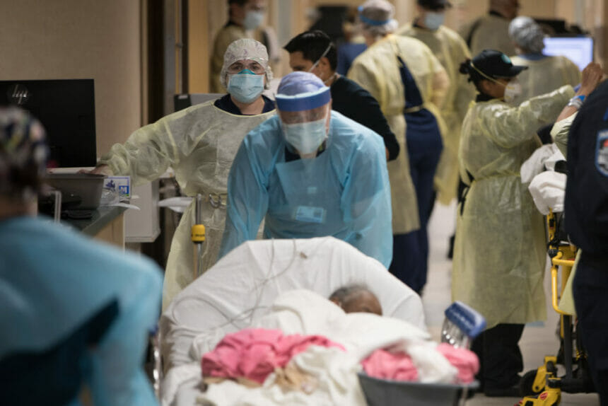 Oceanside, N.Y.: Medical personnel move patients in a bustling hallway in the emergency department during the coronavirus (COVID-19) pandemic at Mount Sinai South Nassau Hospital in Oceanside, New York on April 13, 2020. (Photo by Jeffrey Basinger/Newsday via Getty Images)