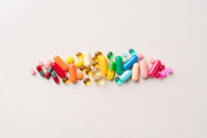 Multi Colored Medical Pills Organized in a Row