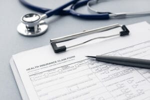 Health Insurance claim form on desk