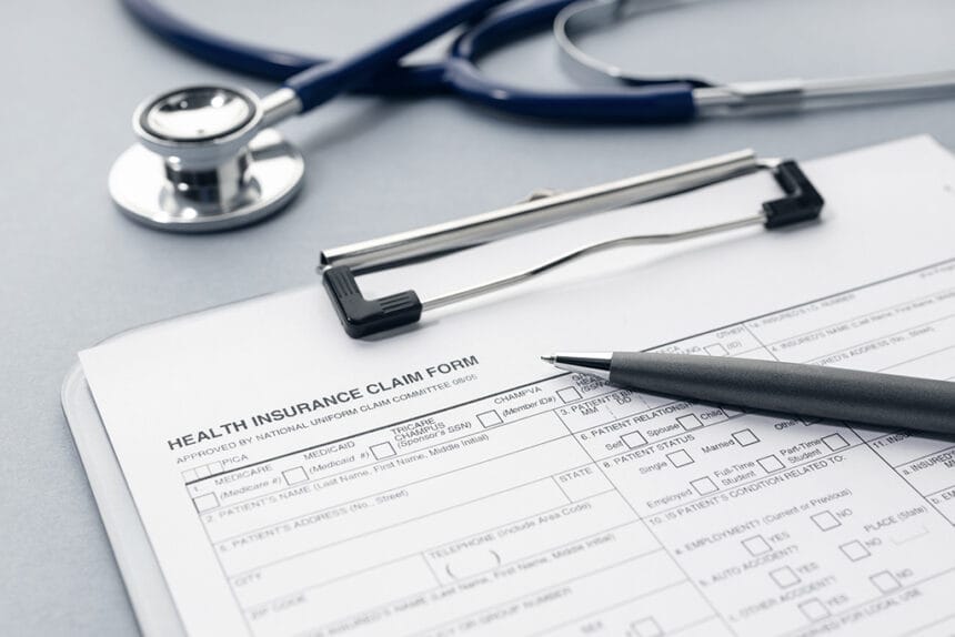 Health Insurance claim form on desk