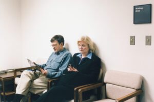 Man and Woman in Waiting Room