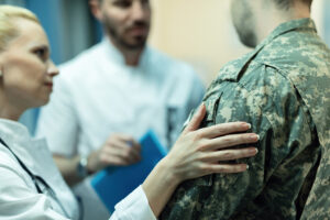 Close up of army soldier being consoled