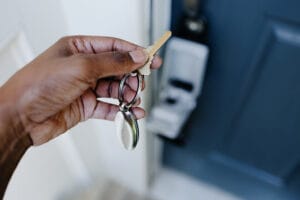 Close-up of real estate agent accessing house key