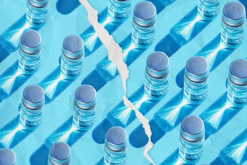 Corona Virus Covid-19 Medical Vaccine Pattern on trendy Blue color background with Torn Paper Effect. Vaccine covid-19 liquid in glass bottle or beauty product with transparent shadow and torn paper. Anti-vaccination marches concept. Copy space. Close-up.