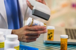 Image of prescription drugs being filled at a pharmacy