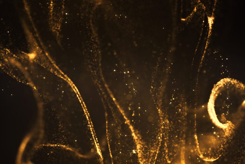 Abstract Background of Blurry Golden Particles