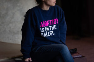 Woman in reproductive freedom shirt