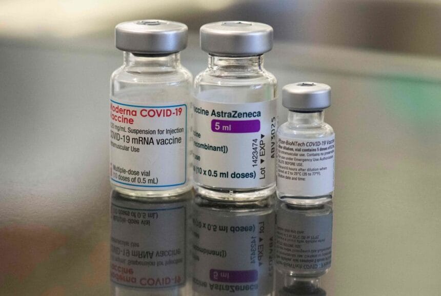 Three vials with different vaccines against Covid-19.
