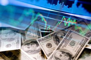 Cash dollar bills and stock market indicators